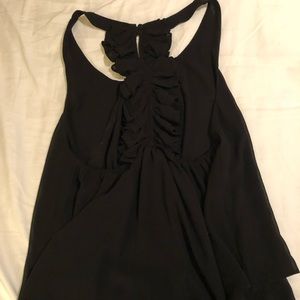Black sheer tank top with ruffled back